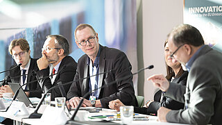 Philip Hawkins (Europäische Kommission), Peter Gyergyay (CINEA), Uwe Lützen (CINEA), Kathrin Wolf (NKS IF) und Dr. Remo Tiedemann (KEI)